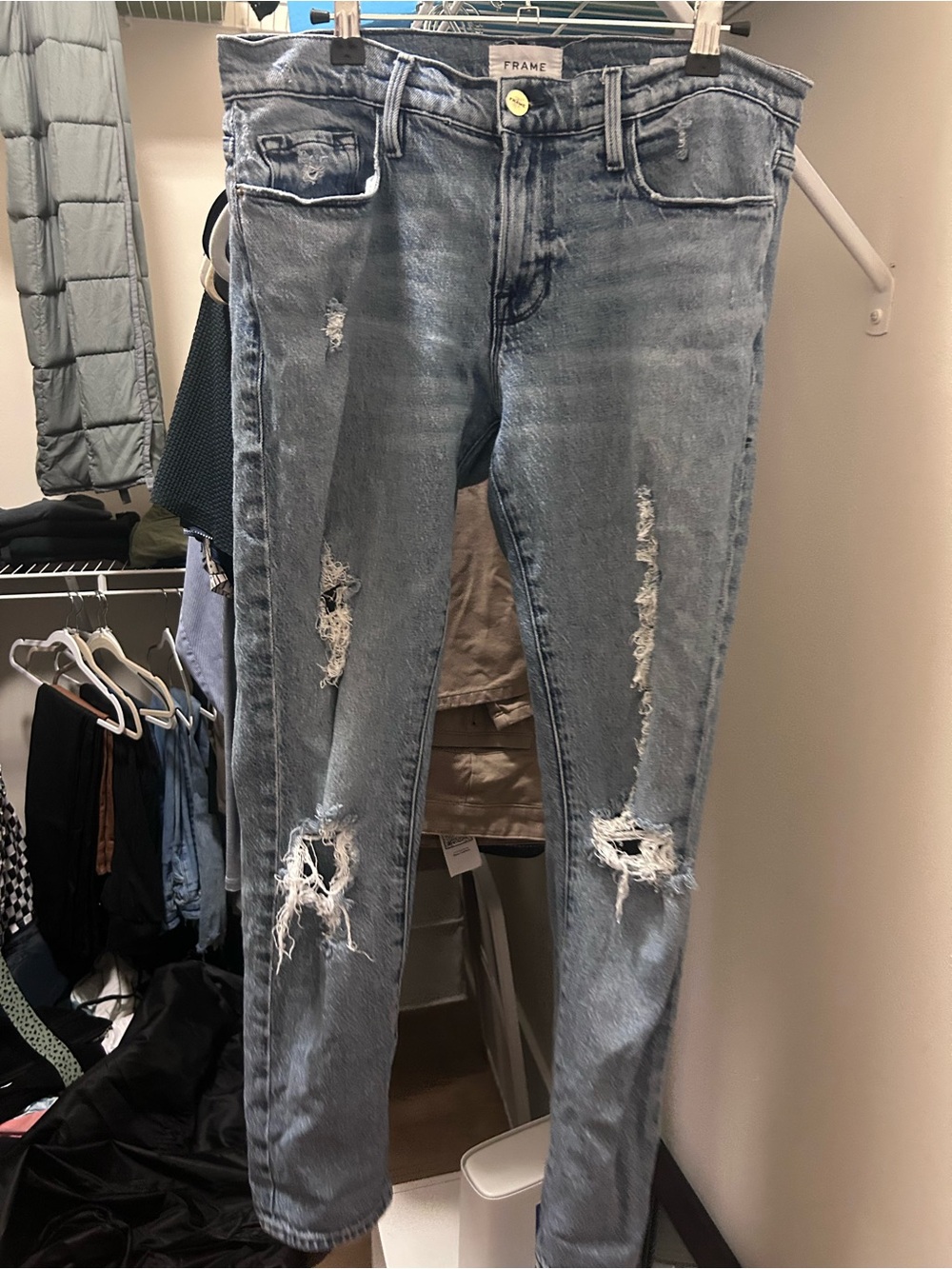Frame Denim Light Wash Distressed Skinny Jeans